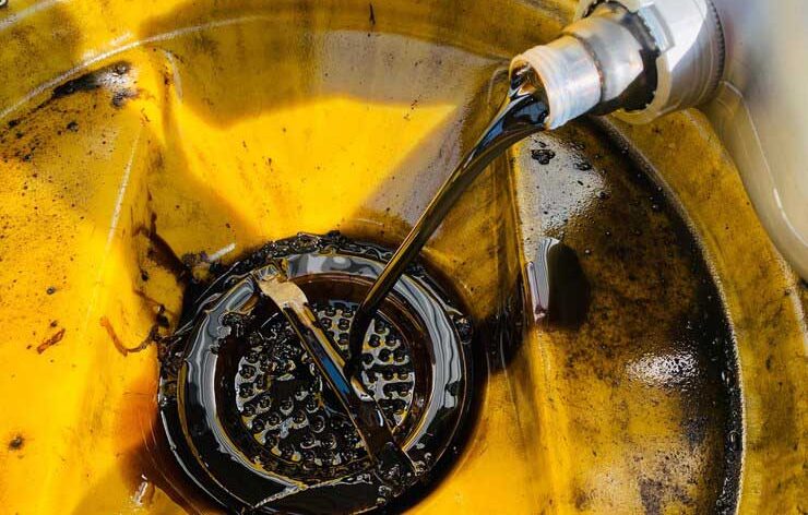 high-angle-view-oil-pouring-machine